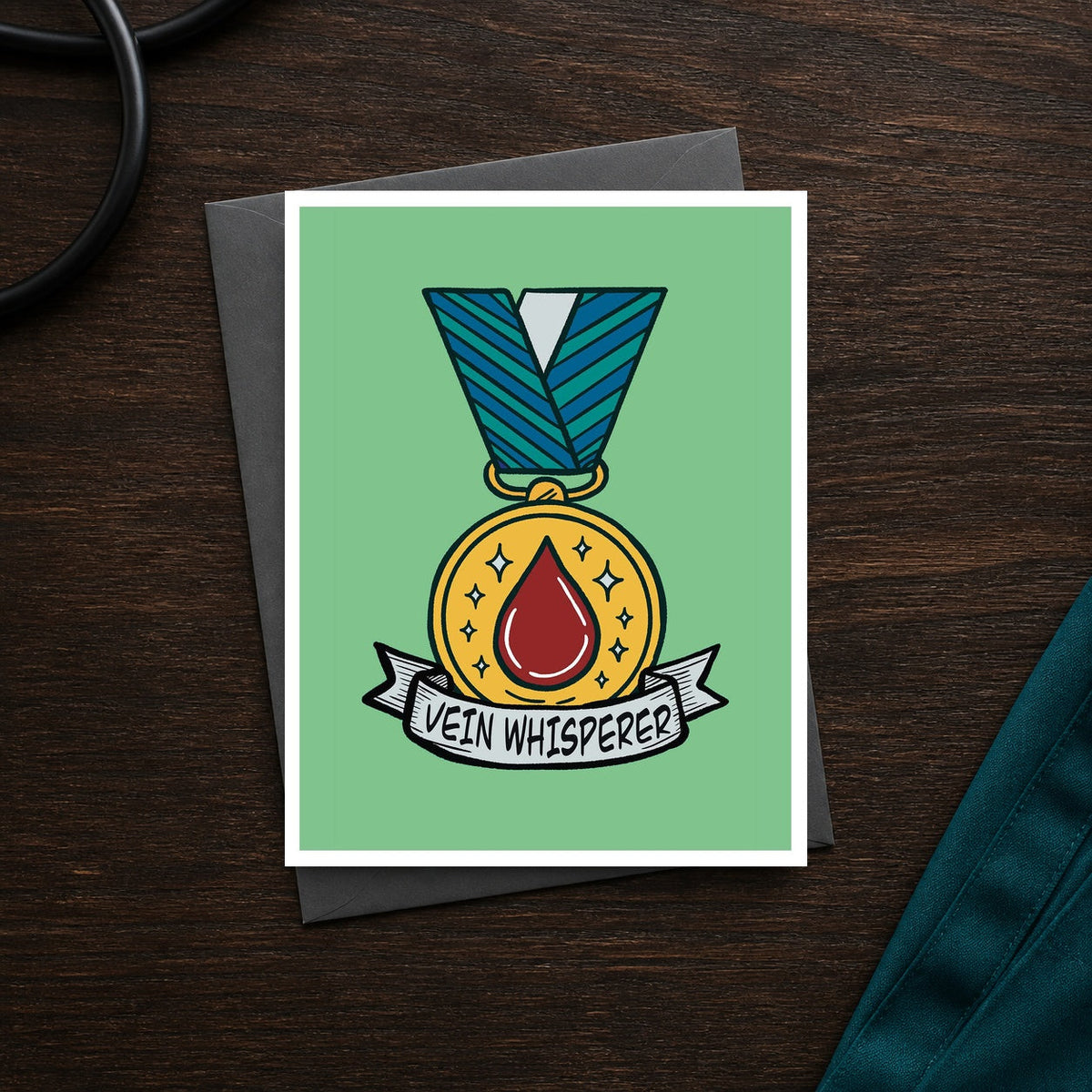 Vein Whisperer A2 veterinary recognition notecard front on a dark clinic desk