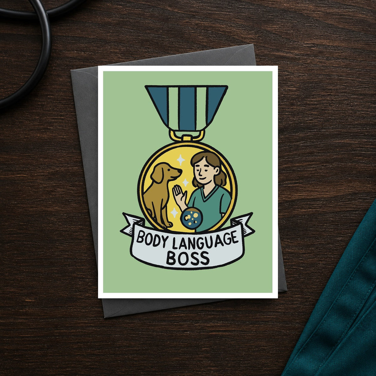 Body Language Boss A2 veterinary recognition notecard front on a dark clinic desk