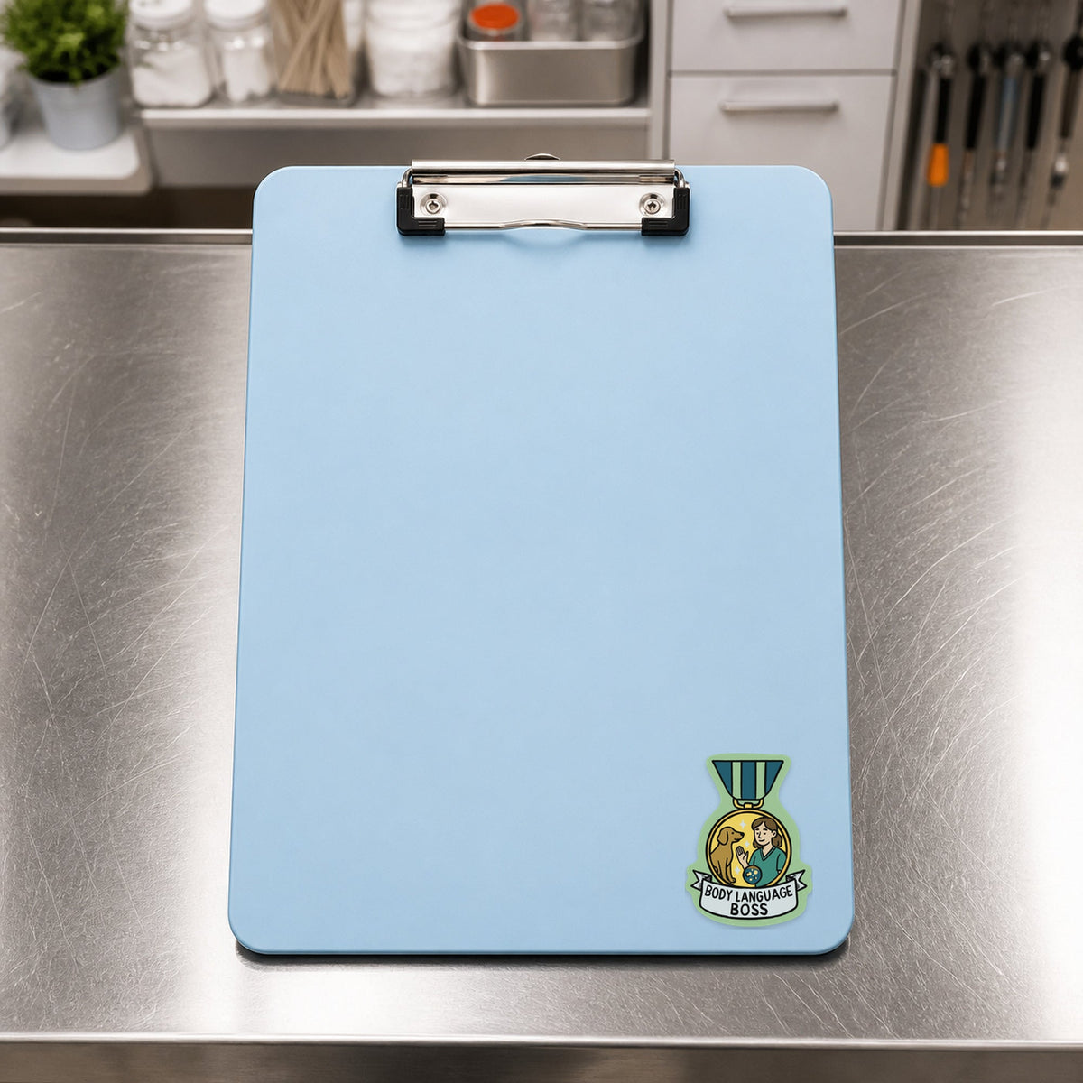 Body Language Boss – Award Medal Sticker shown on a blue treatment clipboard