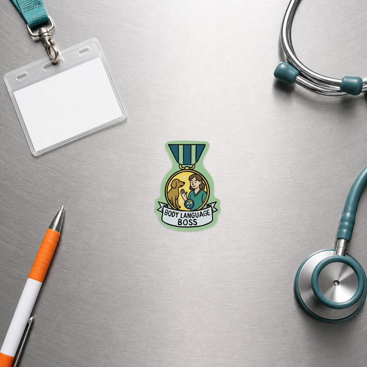 Body Language Boss – Award Medal Sticker shown in a veterinary clinic flat lay