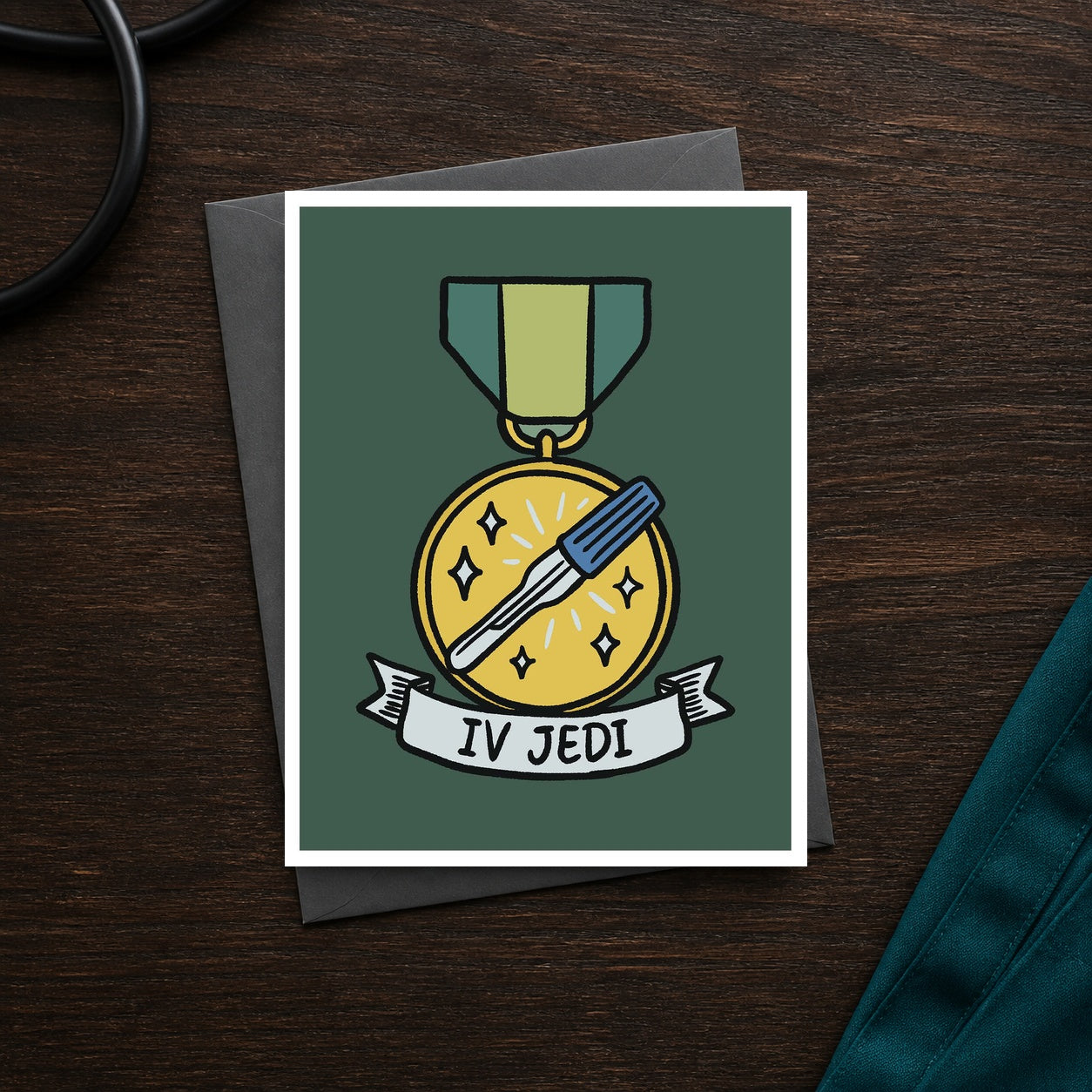 IV Jedi A2 veterinary recognition notecard front on a dark clinic desk