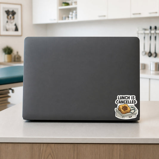 Lunch Is Cancelled – Funny Veterinary Sticker shown on a veterinary clinic laptop