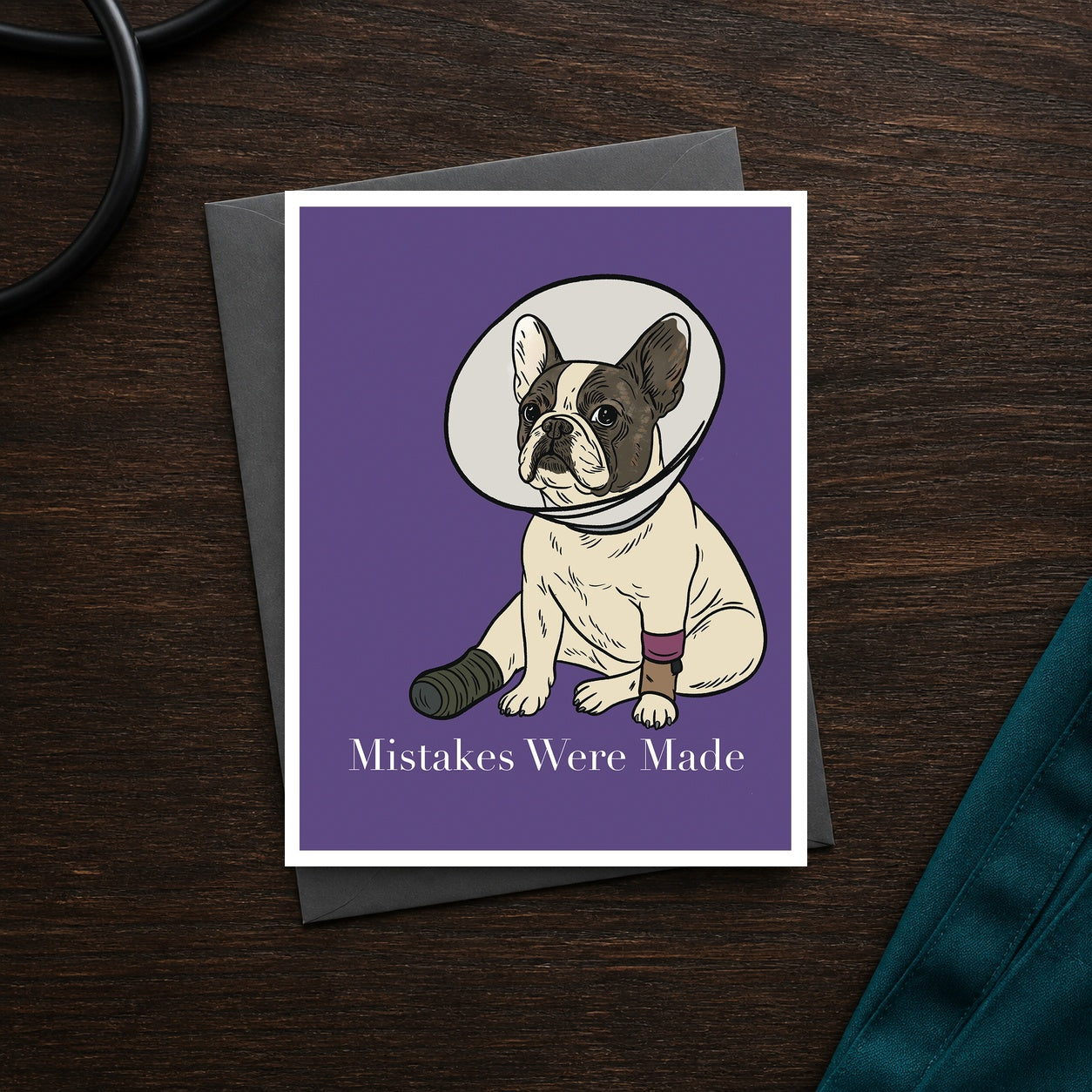Mistakes Were Made A2 veterinary notecard front on a dark clinic desk