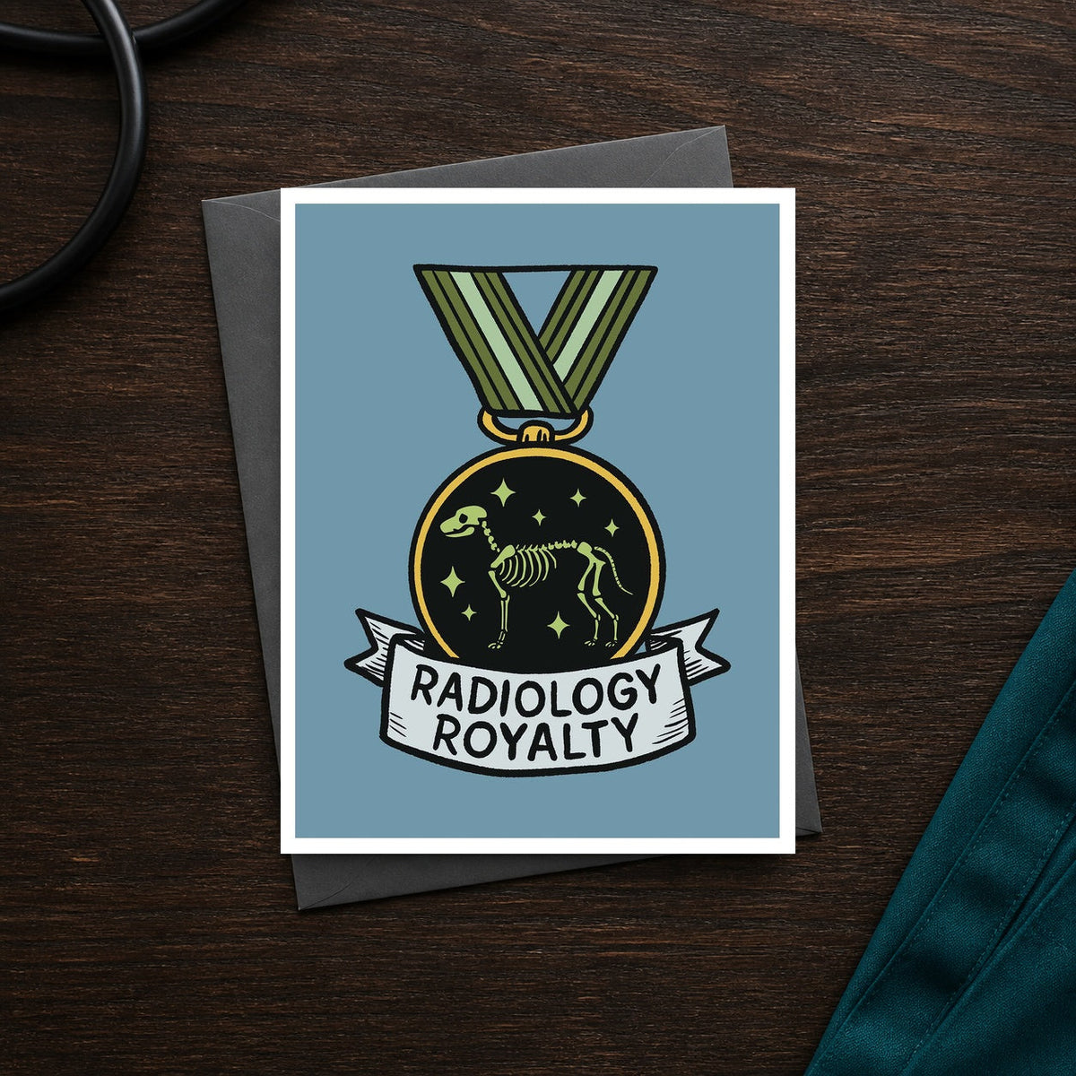 Radiology Royalty A2 veterinary recognition notecard front on a dark clinic desk