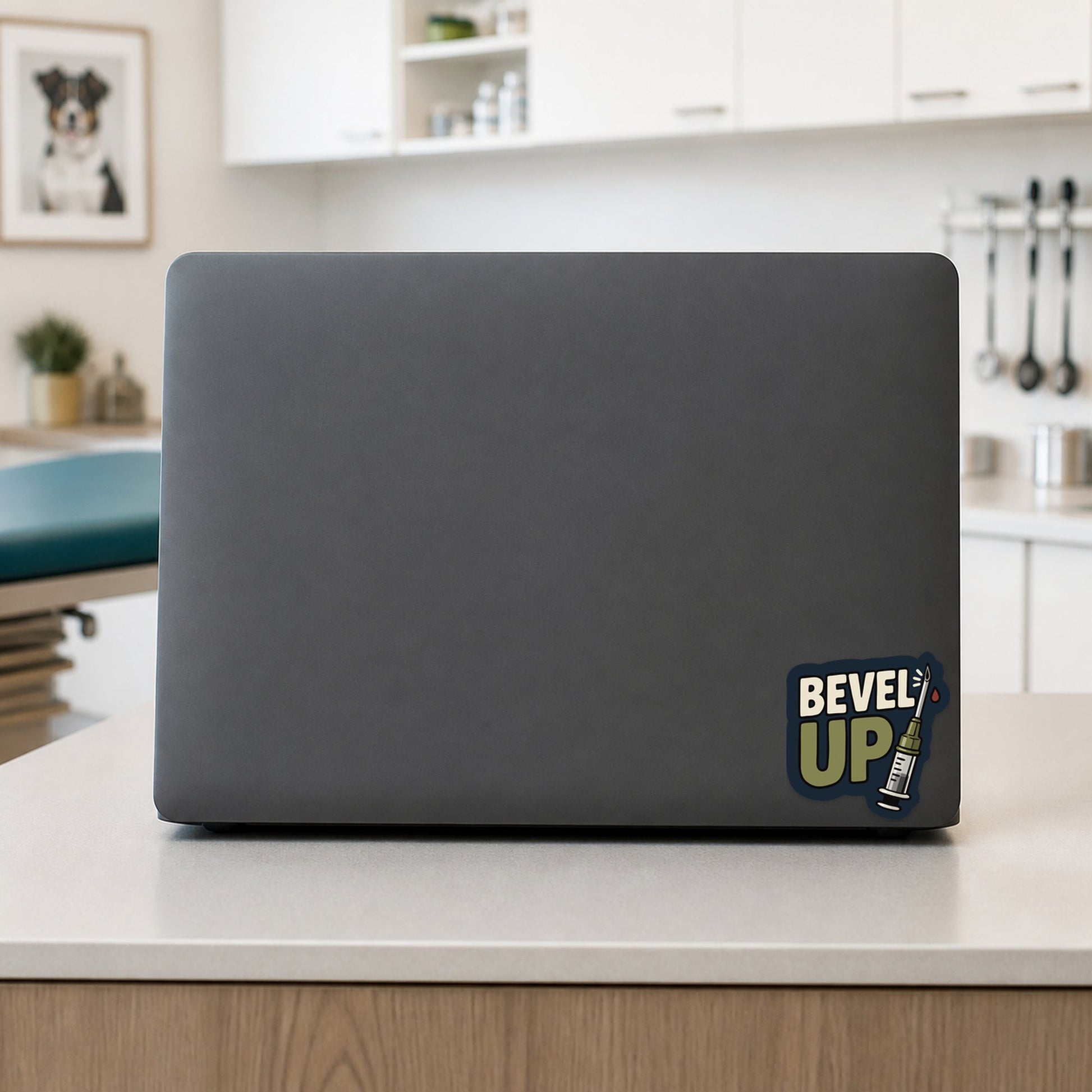 💉 Bevel Up – Funny Vet Phlebotomy Sticker shown on a veterinary clinic laptop