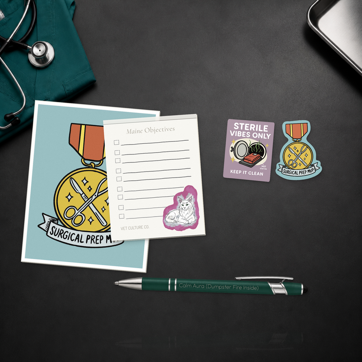 Surgery Suite Sanity Kit with a Surgical Prep MVP card, notepad, engraved pen, and two stickers, shown in a close material-detail scene for veterinary professionals