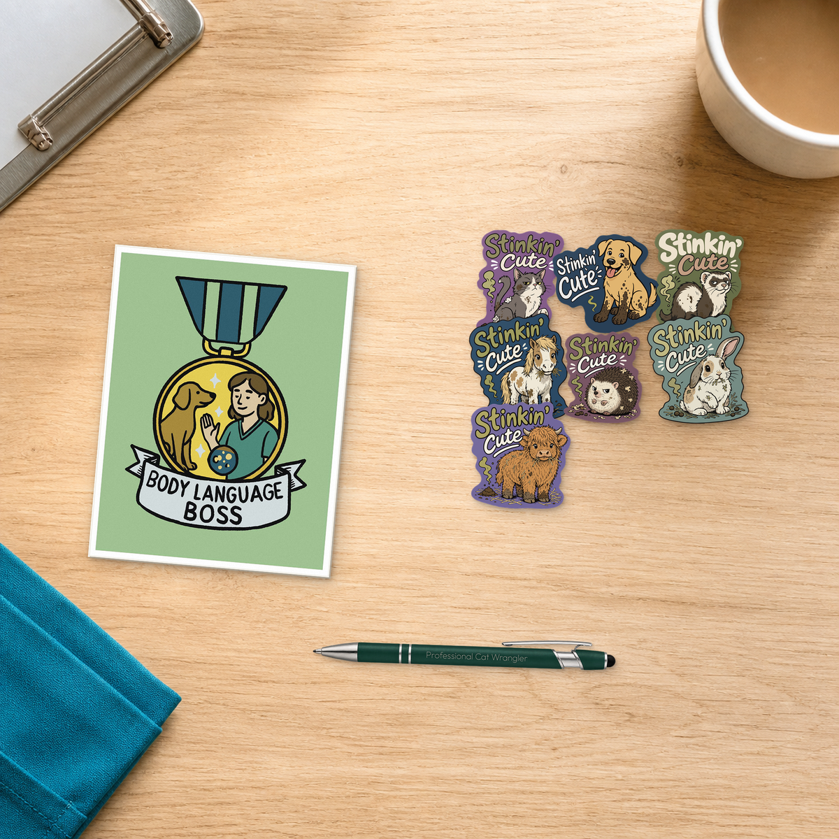 Tiny Patient Fan Club with a Body Language Boss card, engraved pen, and seven animal stickers, arranged on a light oak desktop for veterinary professionals