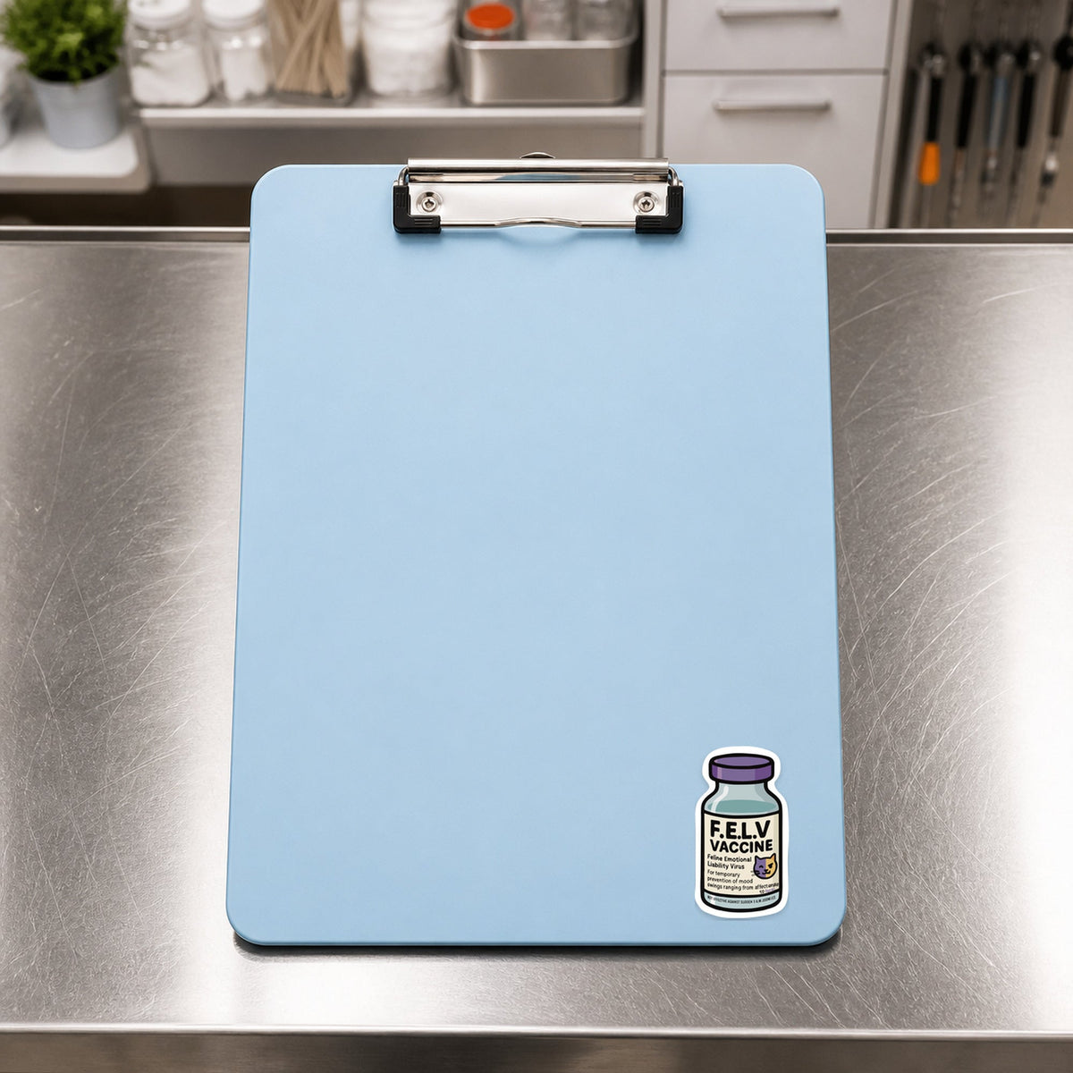 F.E.L.V. Vaccine – Funny Vet Sticker shown on a blue treatment clipboard