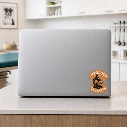 Cytology Season fall veterinary sticker on a laptop in a clinic break room