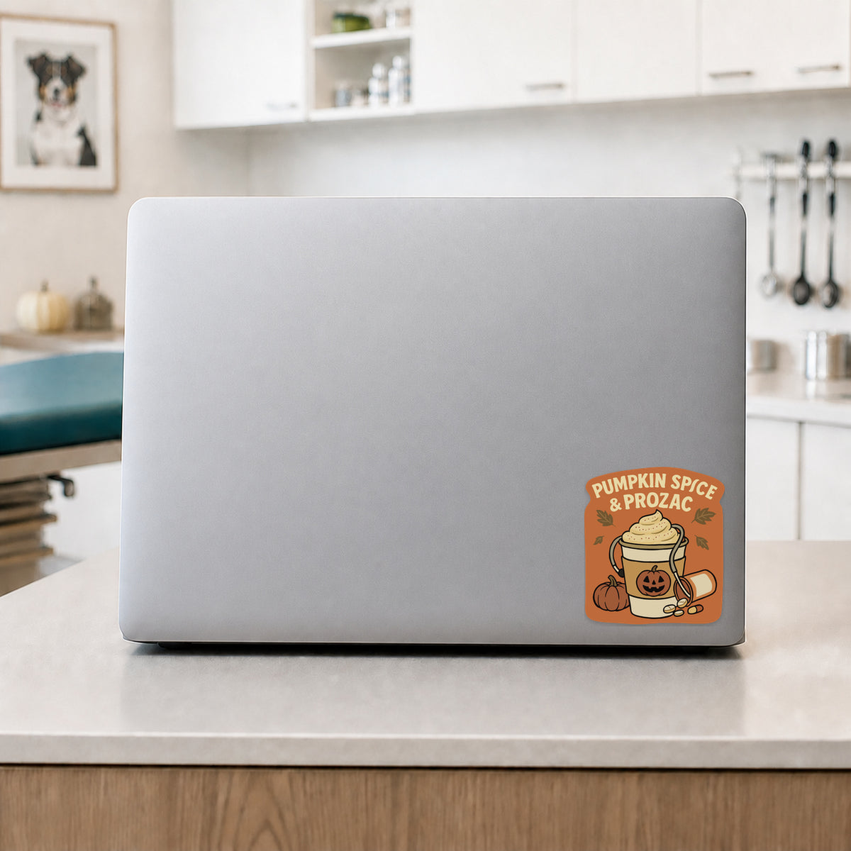 Pumpkin Spice and Prozac fall veterinary sticker on a laptop in a clinic break room