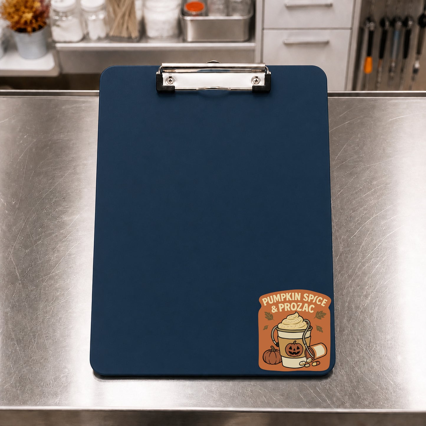 Pumpkin Spice and Prozac fall veterinary sticker on a navy clinic clipboard