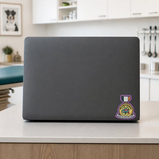 Wellness Warrior – Award Medal Sticker shown on a veterinary clinic laptop